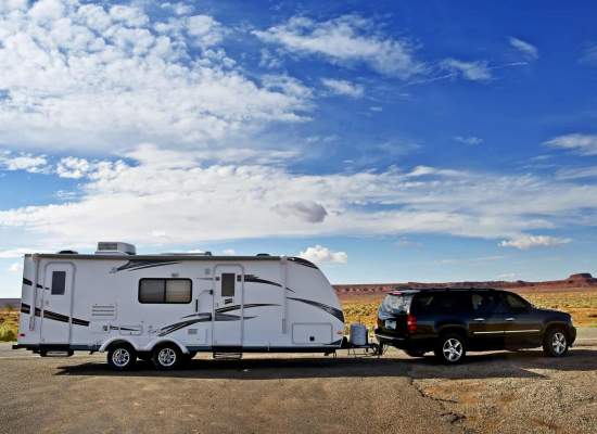 Travel Trailer Pulled by a Large SUV, in Arizona, USA